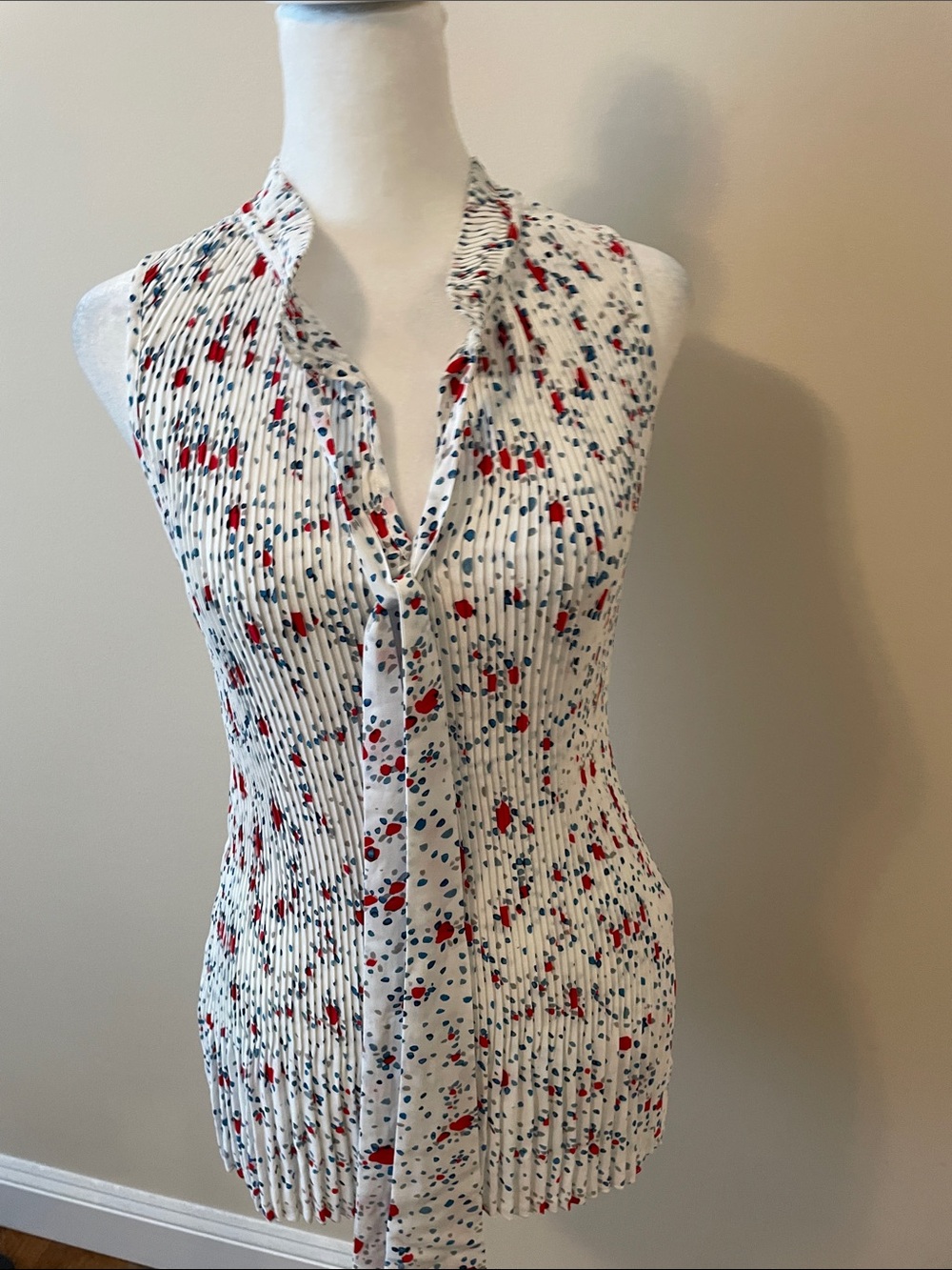 White Sleeveless Pleated Blouse with Red & Navy Floral Dots length 26”